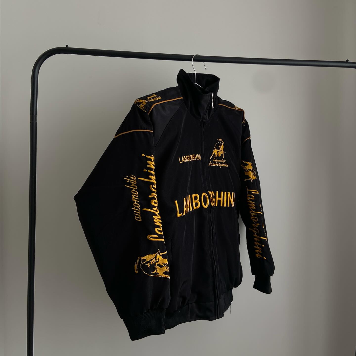 This is Embroidered lamborghini racing jacket in black for unisex.
