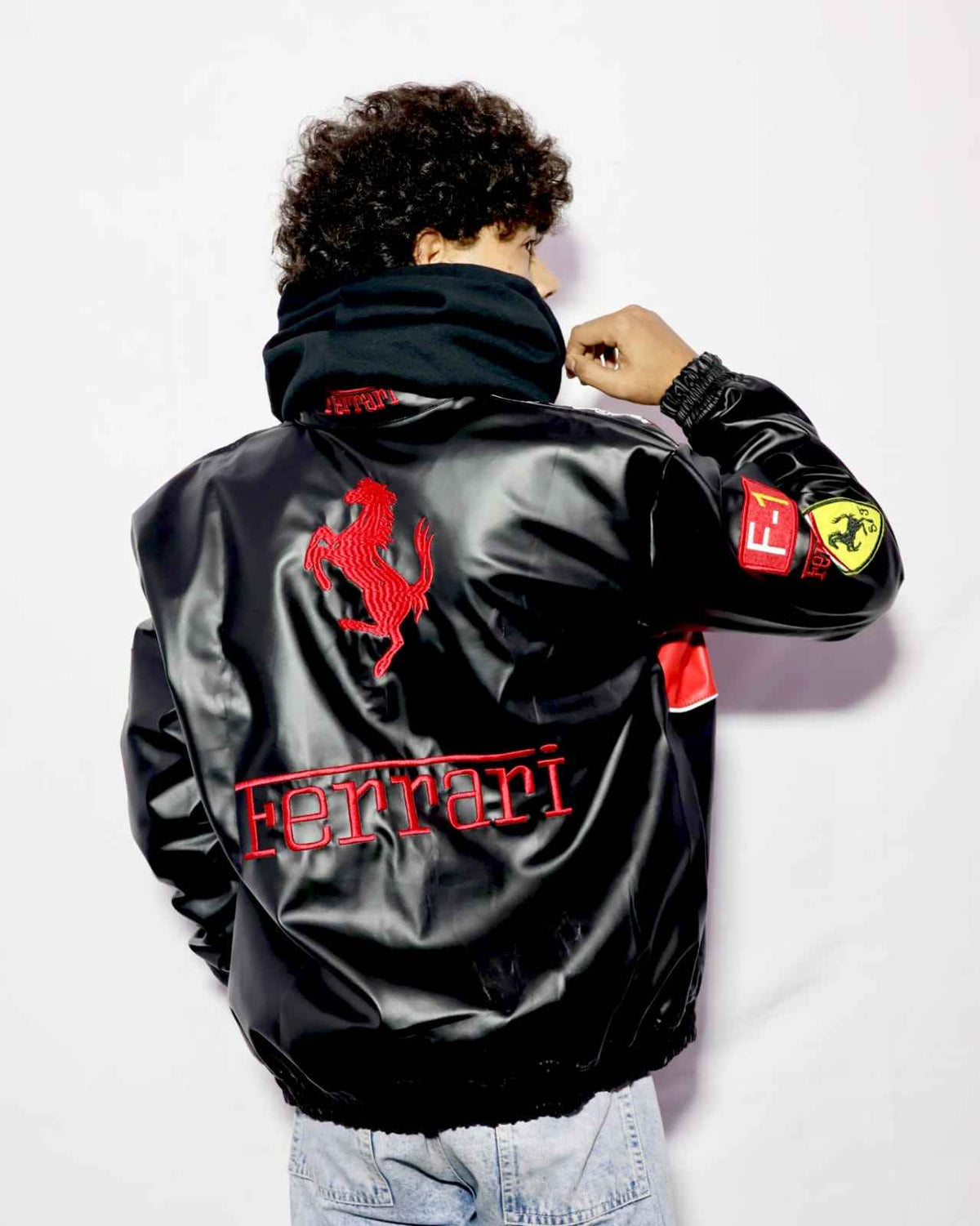Elegant black embroidered racing jacket by Xoratic