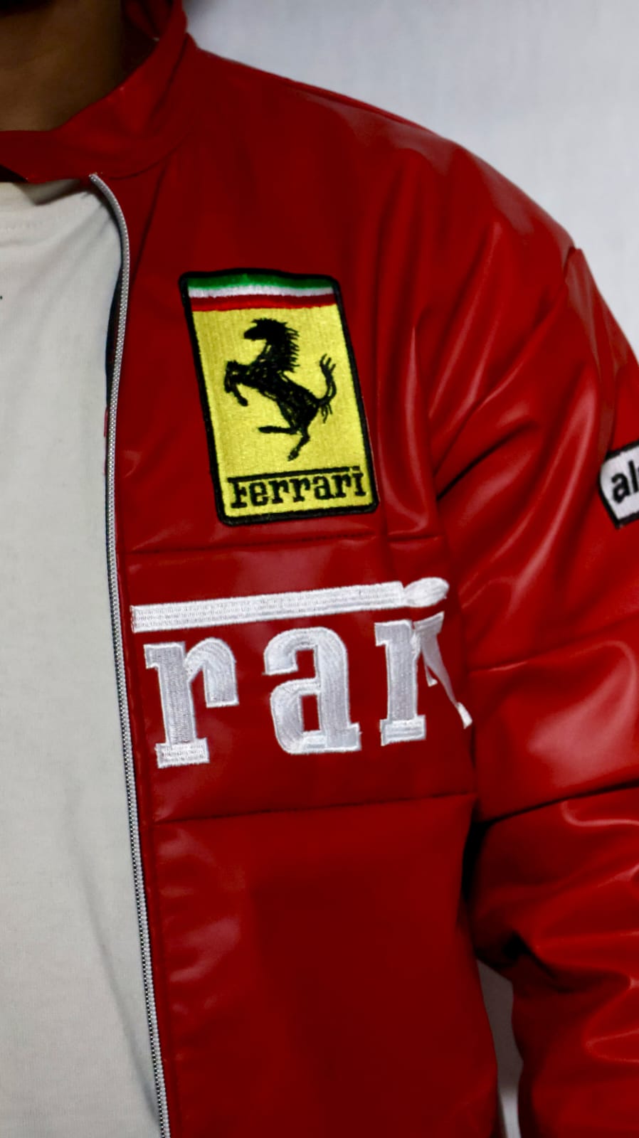 Red ferrari jacket in leather for unisex.