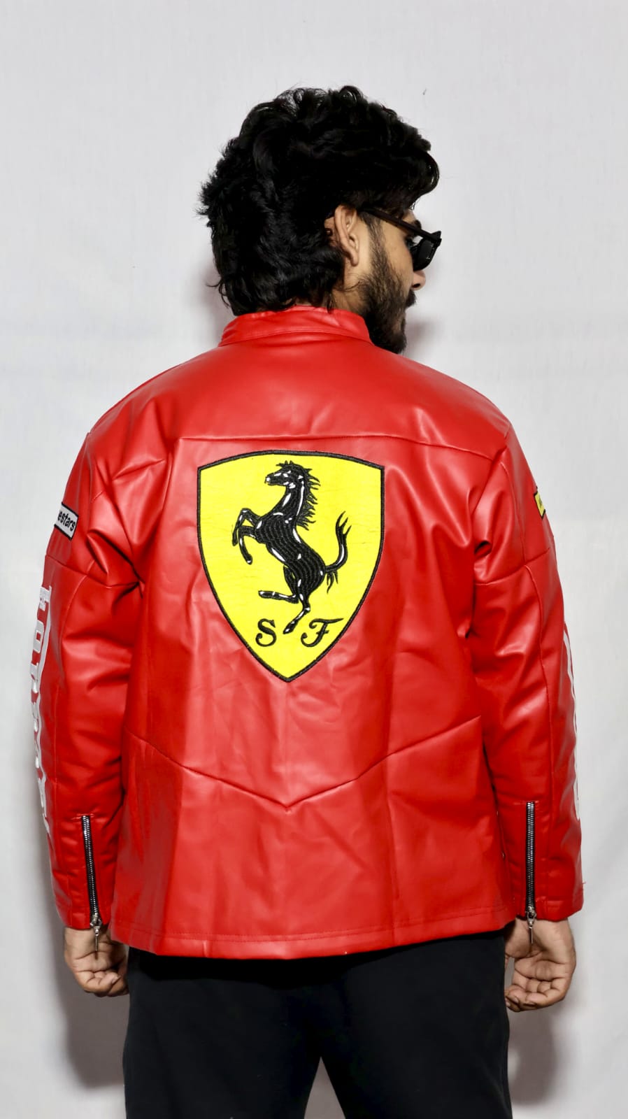 Red ferrari jacket in leather for unisex.