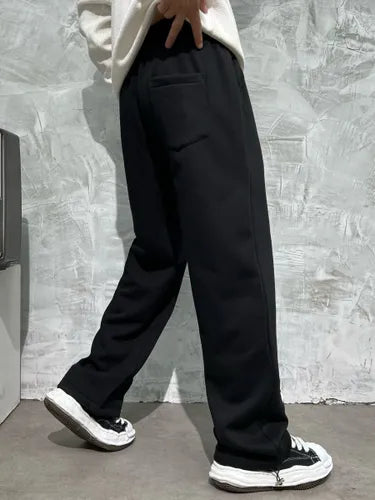 Black Jogger Pants with White Gothic Cross Patches.