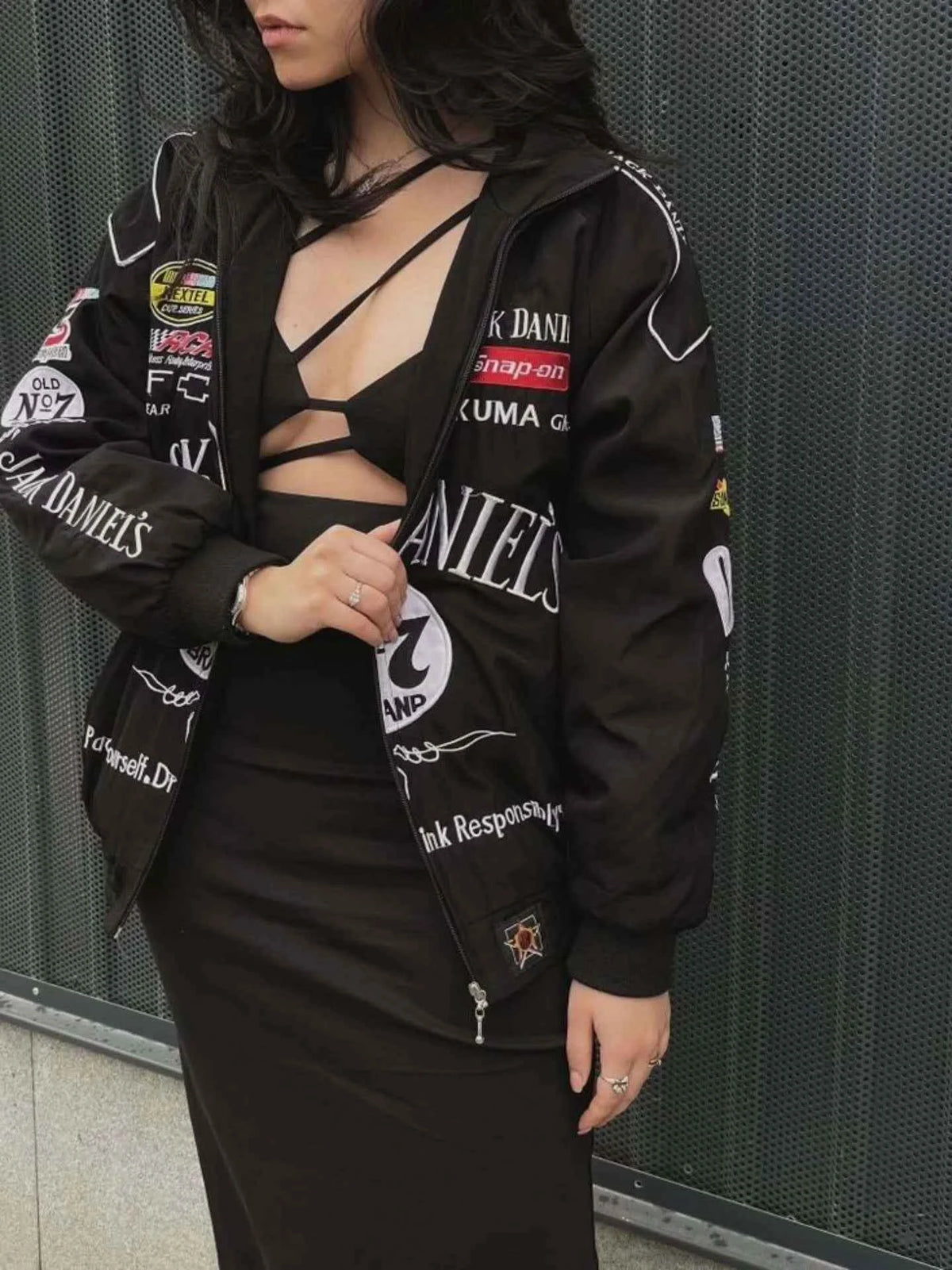 Black heritage-style racing jacket by Xoratic