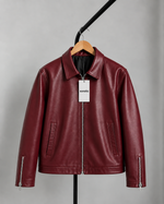 Burgundy leather jacket, front view, stand collar, zip pockets, zip cuffs