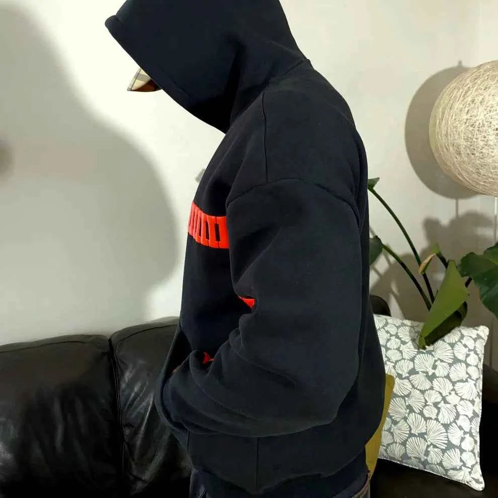 Elevate Your Style with the I Love You This Much Hoodie in Black, a Xoratic Hoodie featuring a hood, long sleeves, and bold red chest graphic.