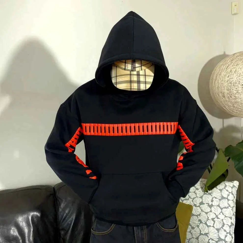 Elevate Your Style with the I Love You This Much Hoodie in Black by Xoratic featuring a hood red stripe details and front kangaroo pocket Hoodie collection