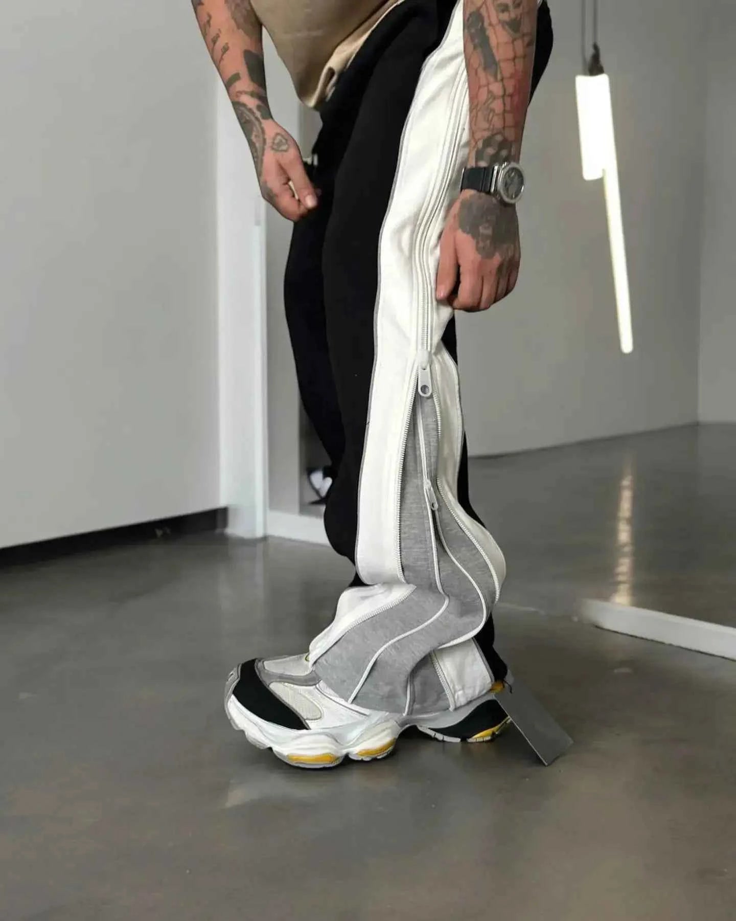 Black Jogger Pants with zip up.
