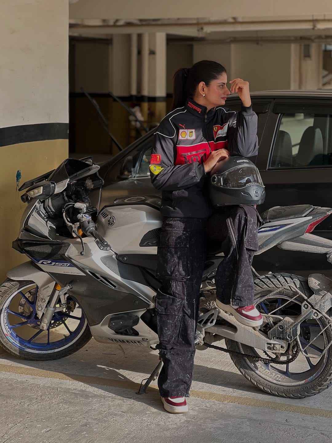 Ferrari Racing Jacket Combo - Embrace Style and Performance by Xoratic in Combo Offers, woman wearing a racing jacket on a sport motorcycle with a helmet