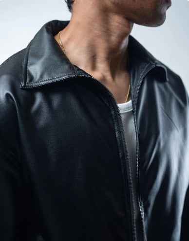 Effortless black faux leather jacket by Xoratic