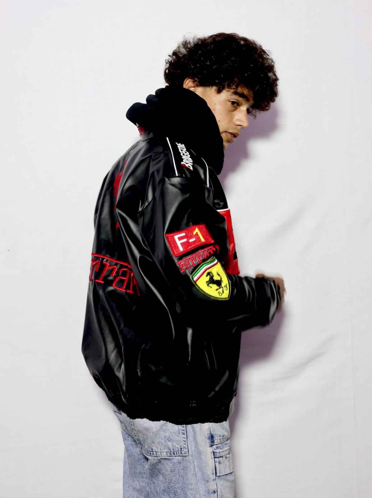 Elegant black embroidered racing jacket by Xoratic