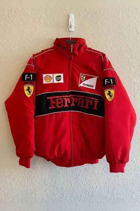 Elevate Your Look with the Ferrari Racing Jacket in Bold Red, a red Ferrari racing jacket with racing logos and a black stripe, by Xoratic.