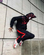 Black spider-inspired hoodie set by Xoratic