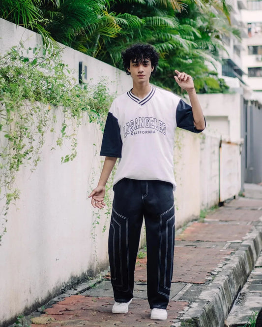 Urban Edge: Black Wide-Leg Pants with White Geometric Stitching